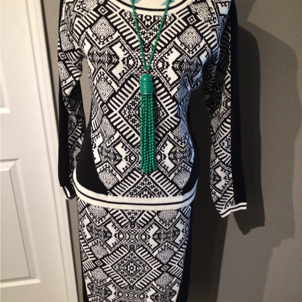 Nicole Miller knit sweater and skirt.